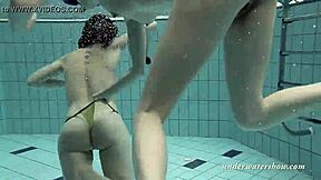 loris and okunewa dive into steamy lesbian play underwater in the pool.