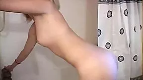 Steamy shower scene with busty babe