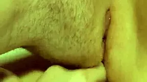 This teen is fingering and licking her shaved wet pussy.