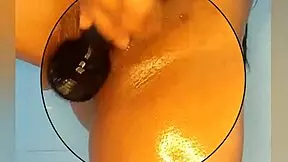 Squirting climax with oil shower