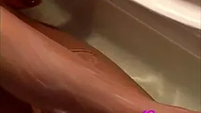 andi land undresses and shows her small tits and shaved pussy by the pool