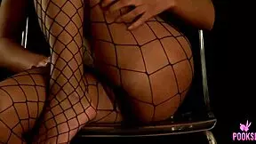 Genesis fingers her shaved pussy in lingerie