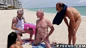 Lovely teen banged with fat dicks on beach