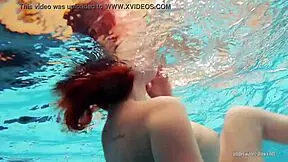 i'm redheaded katrin strippin underwater