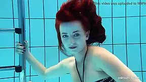 i'm redheaded katrin strippin underwater