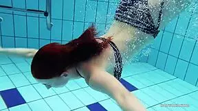 i'm redheaded katrin strippin underwater