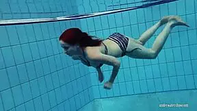 i'm redheaded katrin strippin underwater