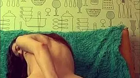 beautiful brunette exploring her body with toys