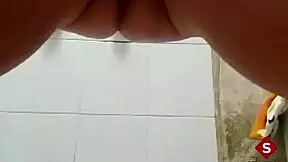 teen 18+ with tattoo warms up in bathtub using fingers on big ass and tits