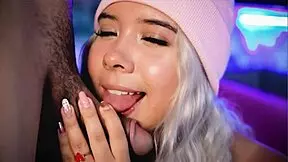 sexy blonde girl gives a close-up webcam performance with care and love