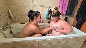 soaping up my bbw girlfriend's big tits in the bathtub, her small tits glistening under the water