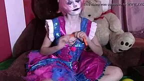 A European clown plays with balloons in an Italian setting.