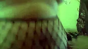 Busty teen in fishnets pleasures herself