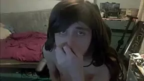 Shemale teen dildoing her mouth while stroking her cock on webcam