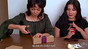 Girls explore fuzzy toys at lesbian slumber party