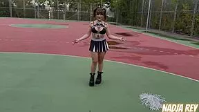 Cheerleader fucks outdoors and swallows cum.