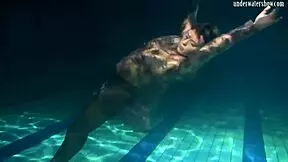 Lozhkova flaunts see-through shorts while swimming in the pool