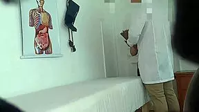 Naughty doctor and his assistant are getting it on.