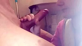 Feeling the thrill of a steamy blowjob in the bathroom before diving into the pool.