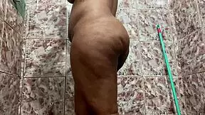 Look at this morena flashing her big tits in the shower