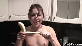 dagfs - these amateur lesbians, a redhead and brunette, get wild kissing in the kitchen at home.