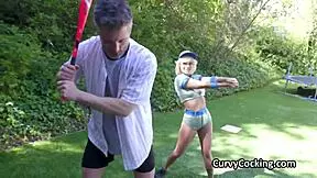 Why not oil up and bang the hot baseball trainer? Oil her curves now.