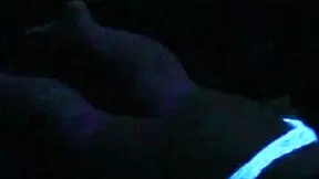 Scarlett Johnson engages in intense blacklight sex under the main lights.