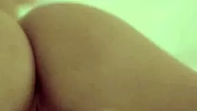 the petite babe strips naked and toys her wet pussy alone