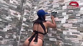 i am a girl who relaxes in a public swimming pool, enjoying the views and attention