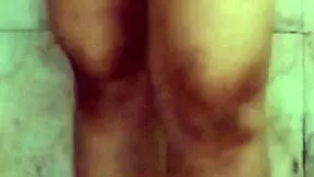 in the bathroom, my hot desi girlfriend masturbates while talking dirty in hindi, showing off her tits and ass.