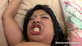 Ever seen a petite Japanese teen take on a huge black cock? What's her limit?