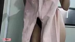 Nini tries on tight leggings, showcasing her big ass