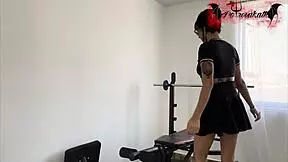 Slender girl slips on rubber flooring