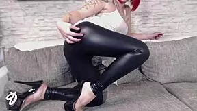 What’s Behind This Sexy Redhead’s Wetlook Legging Striptease in German Style?