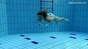 Intriguing Petite Clara's Underwater Small Tits Display