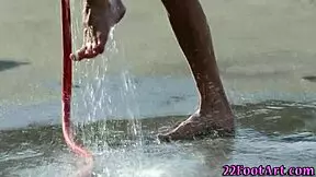 Petite Babe Delivers Intense Footjob Cumshot