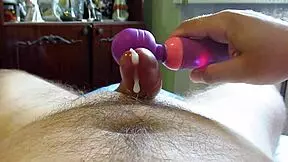 This man roughly jerks off his cock with a toy, cumming hard in slow motion.