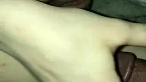 Young woman sucks a huge black cock in piss play