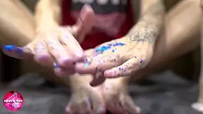 Girl Plays With Glitters And Gives Footjob To Big Dildo