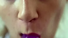 Can you believe this teen is sucking a dildo so passionately in close-up?