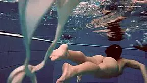 alla swims naked in the hot pool, showing off her petite body