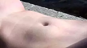 czech beauty flashes shaved pussy on beach for xczech com.