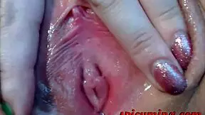 Teen brunette reveals her perfect little pussy close up.