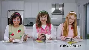 Geek chicks get horny for book and dick at party.