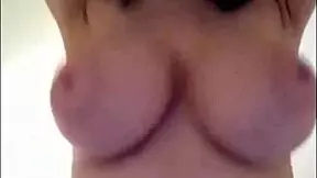 blue haired 18yo girl shows off her huge breasts on webcam in homemade video