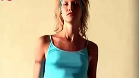 Does the Slim Sexy Young Babe Nicole in Blue Undress to Tease Us with Her Small Tits?