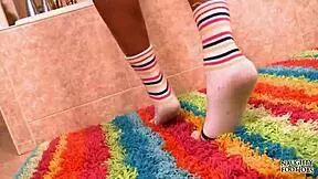 keeani gives a slutty footjob with socks