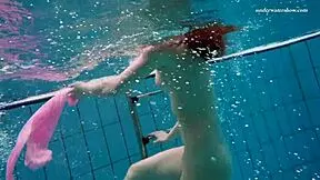 Petite brunette teen Liza Bubarek bathes as underwater mermaid