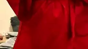 brunette girl in red lingerie masturbates in a reality setting