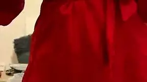 brunette girl in red lingerie masturbates in a reality setting